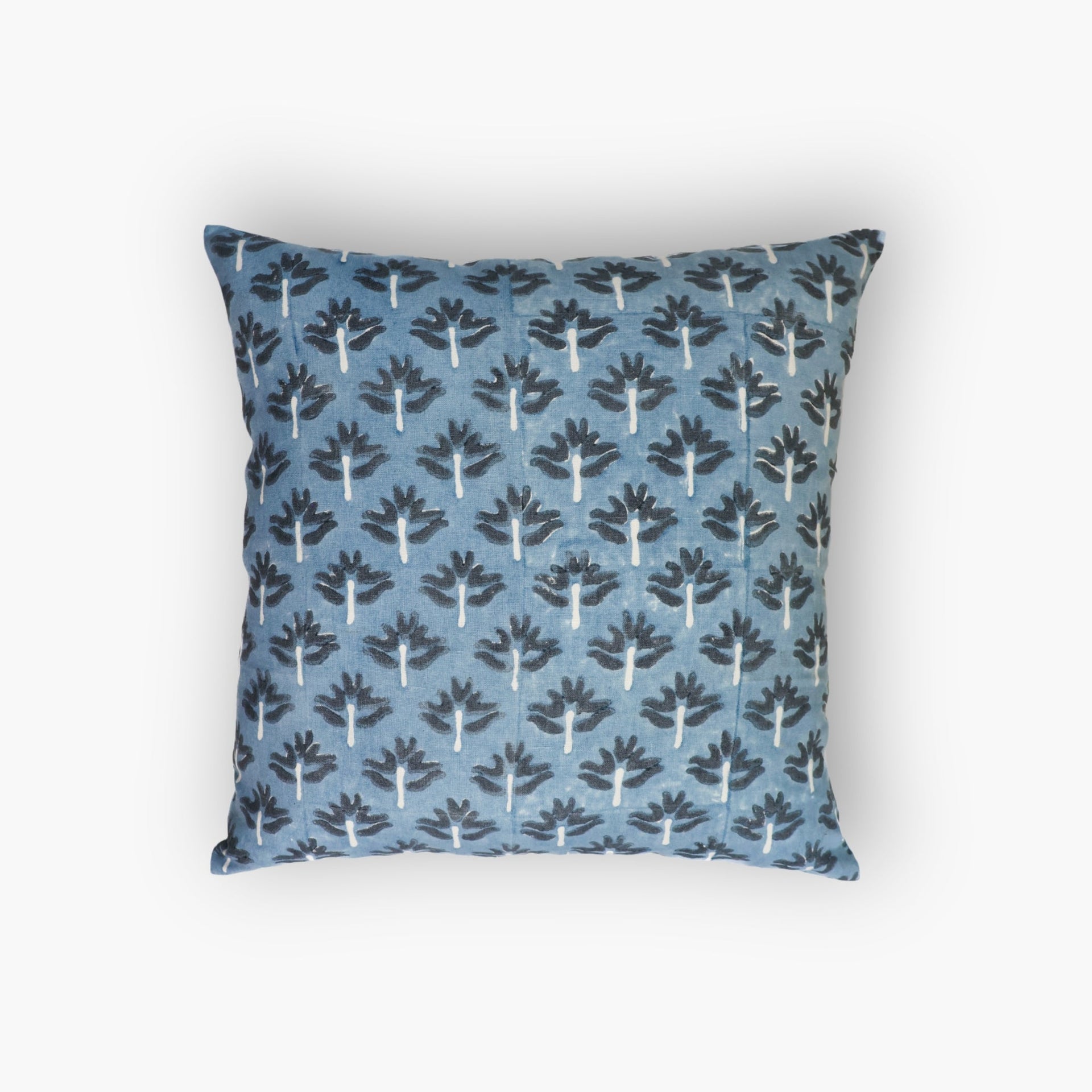 Close up of a Steel Blue Zeenat throw pillow cover with delicate hand-block printed floral patterns on pure linen.