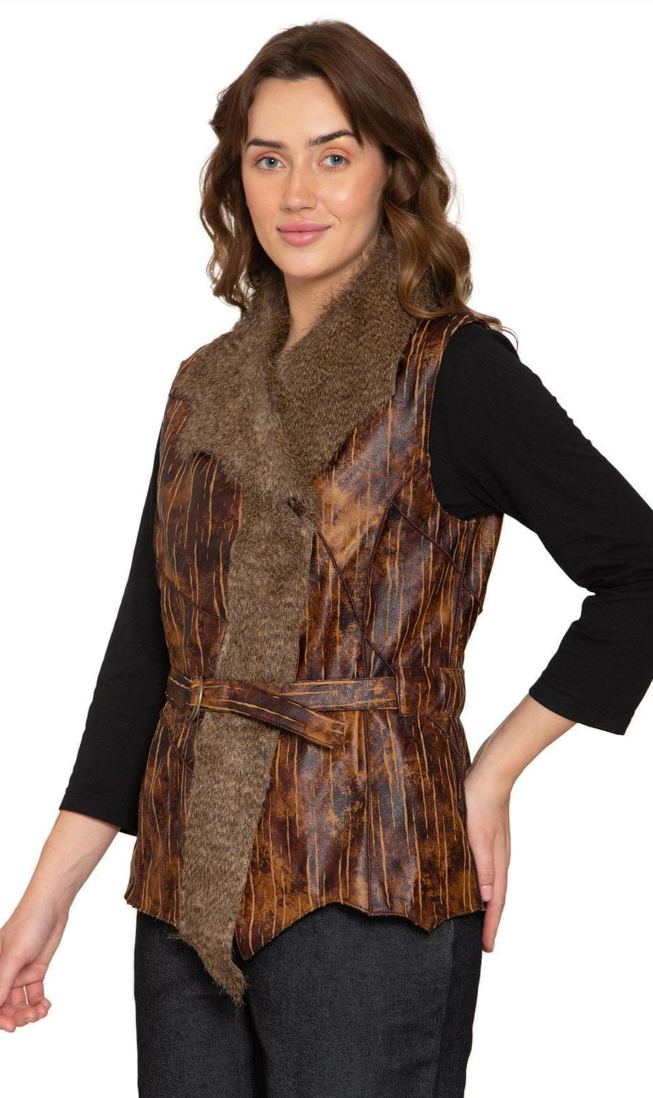 Woman wearing a brown vegan leather vest with faux fur trim and a cinching belt, styled for a western bohemian look.