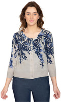 Women's floral print knit cardigan with 3/4 sleeves and decorative embellishments.