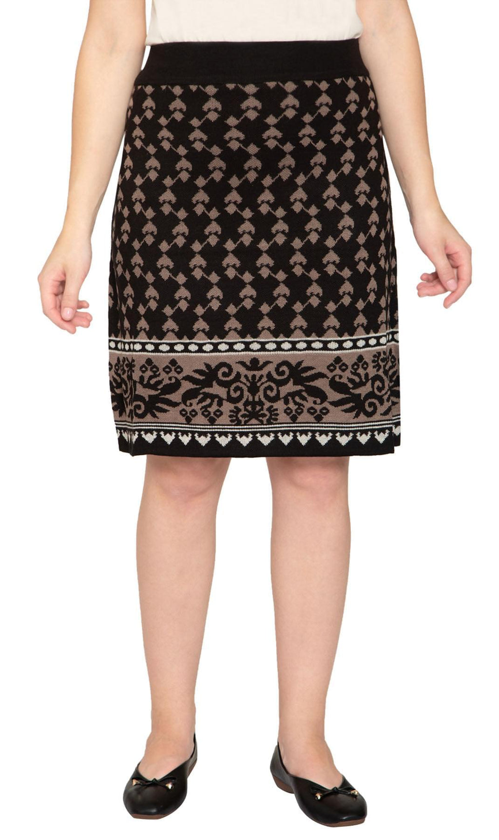 Women wearing a knee-length black and taupe geometric jacquard knit sweater skirt with a pull-on waist.