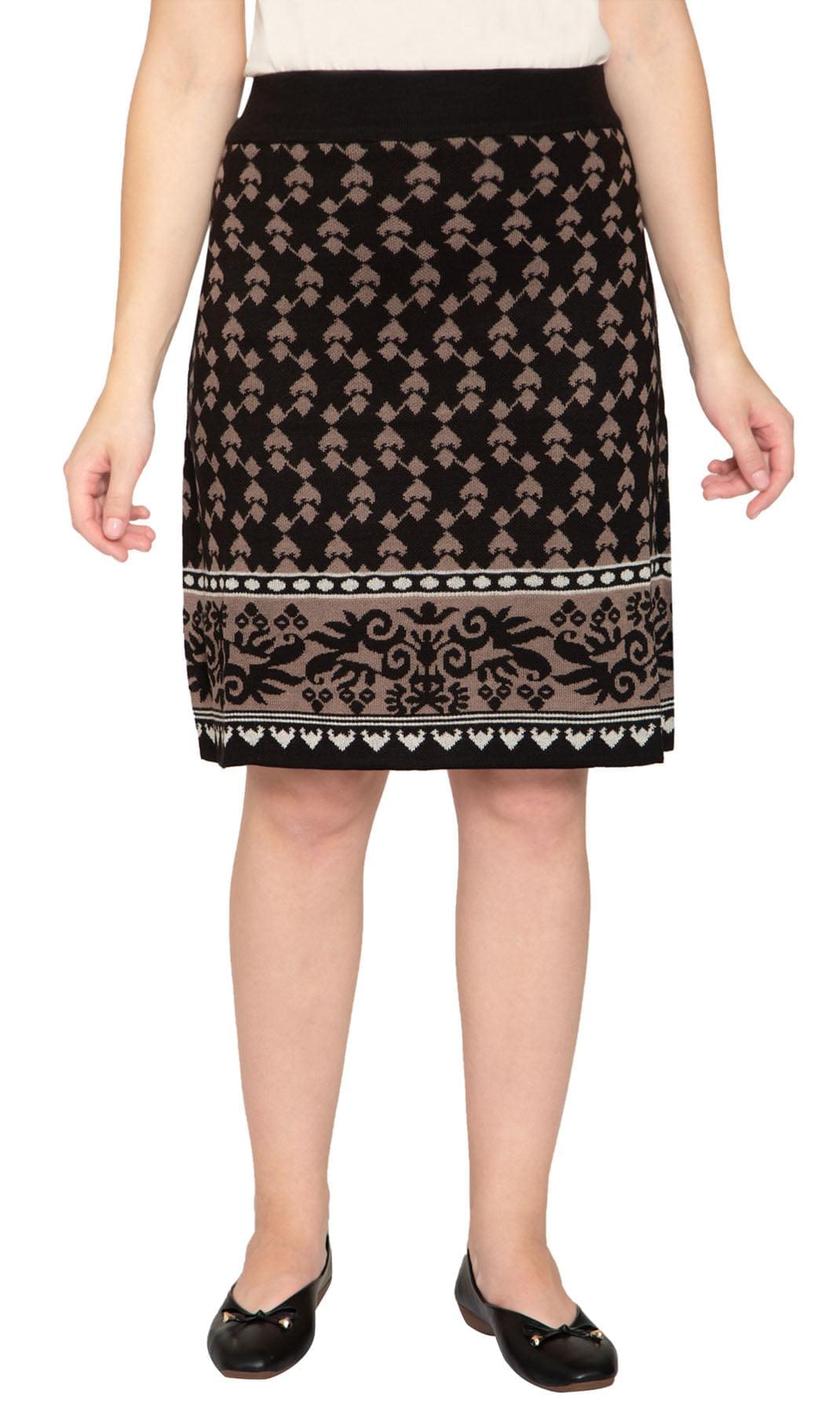 Women wearing a knee-length black and taupe geometric jacquard knit sweater skirt with a pull-on waist.