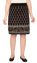 Women wearing a knee-length black and taupe geometric jacquard knit sweater skirt with a pull-on waist.