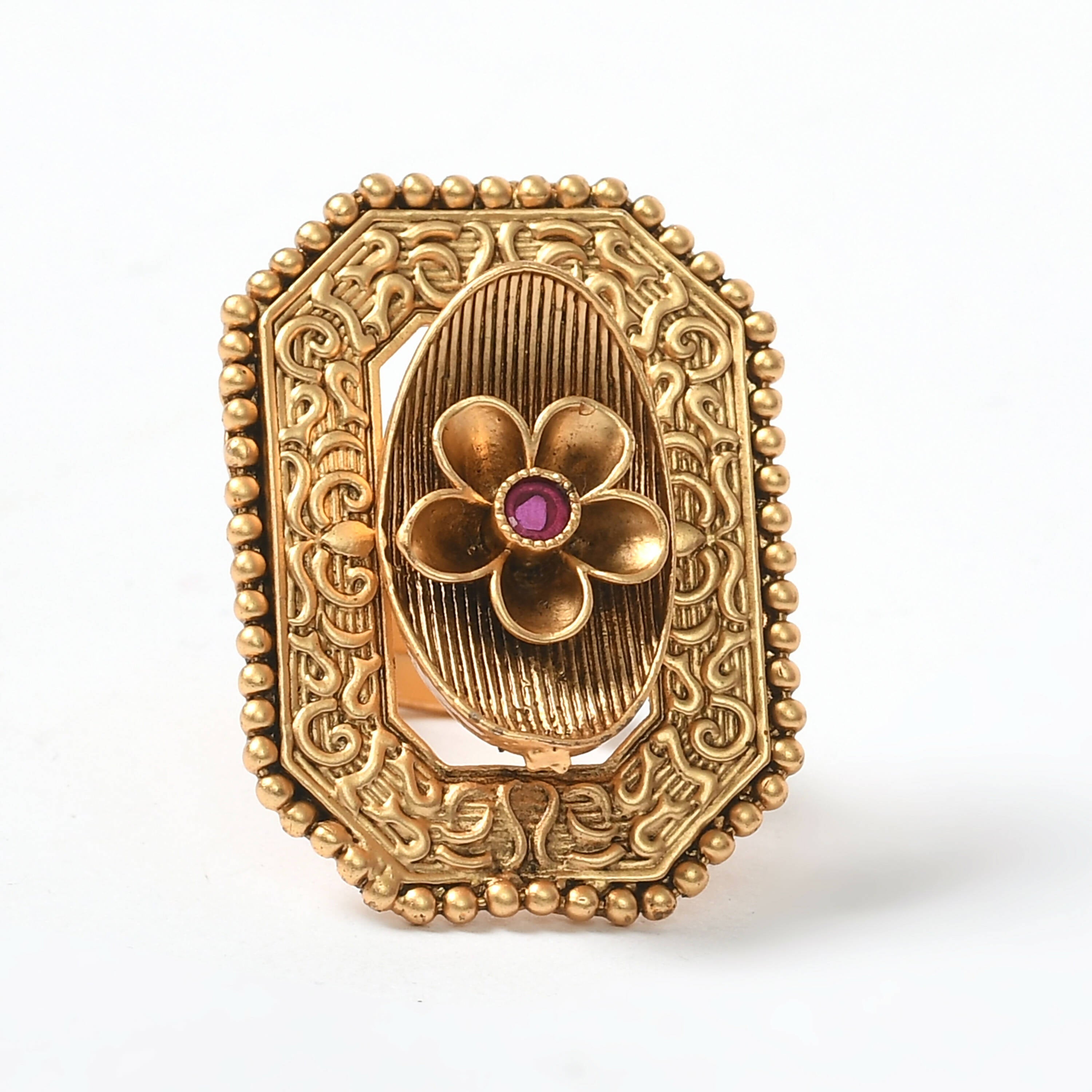 Elegant gold-polished adjustable finger ring with detailed stone inlay