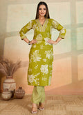 Bright parrot green printed kurta and matching pants in cotton blend