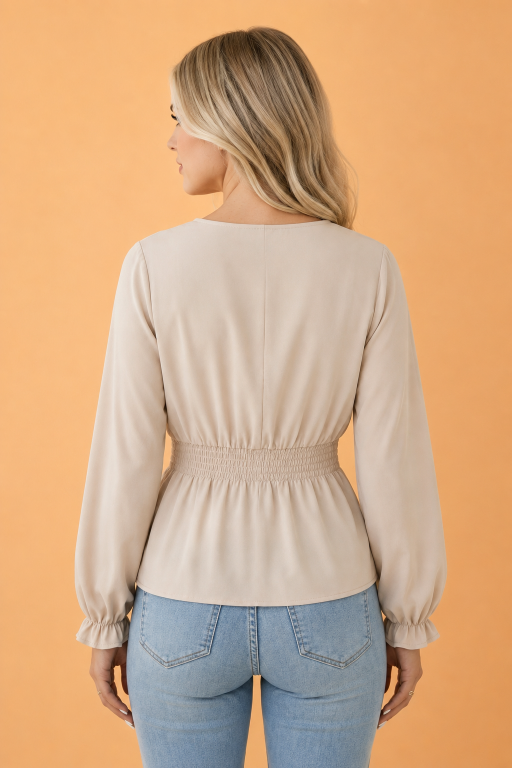 Solid V-Neck Long Sleeve Smocked Waist Peplum Blouse in Beige