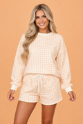 Women's peach and white gingham plaid baggy pullover and matching drawstring shorts loungewear set