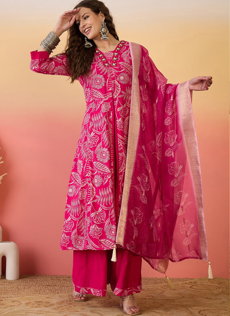 Rani Pink A-line Roman Silk embroidered kurta paired with palazzo and matching dupatta