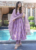 A beautiful lavender muslin printed designer palazzo suit with intricate gota patti and embroidery.