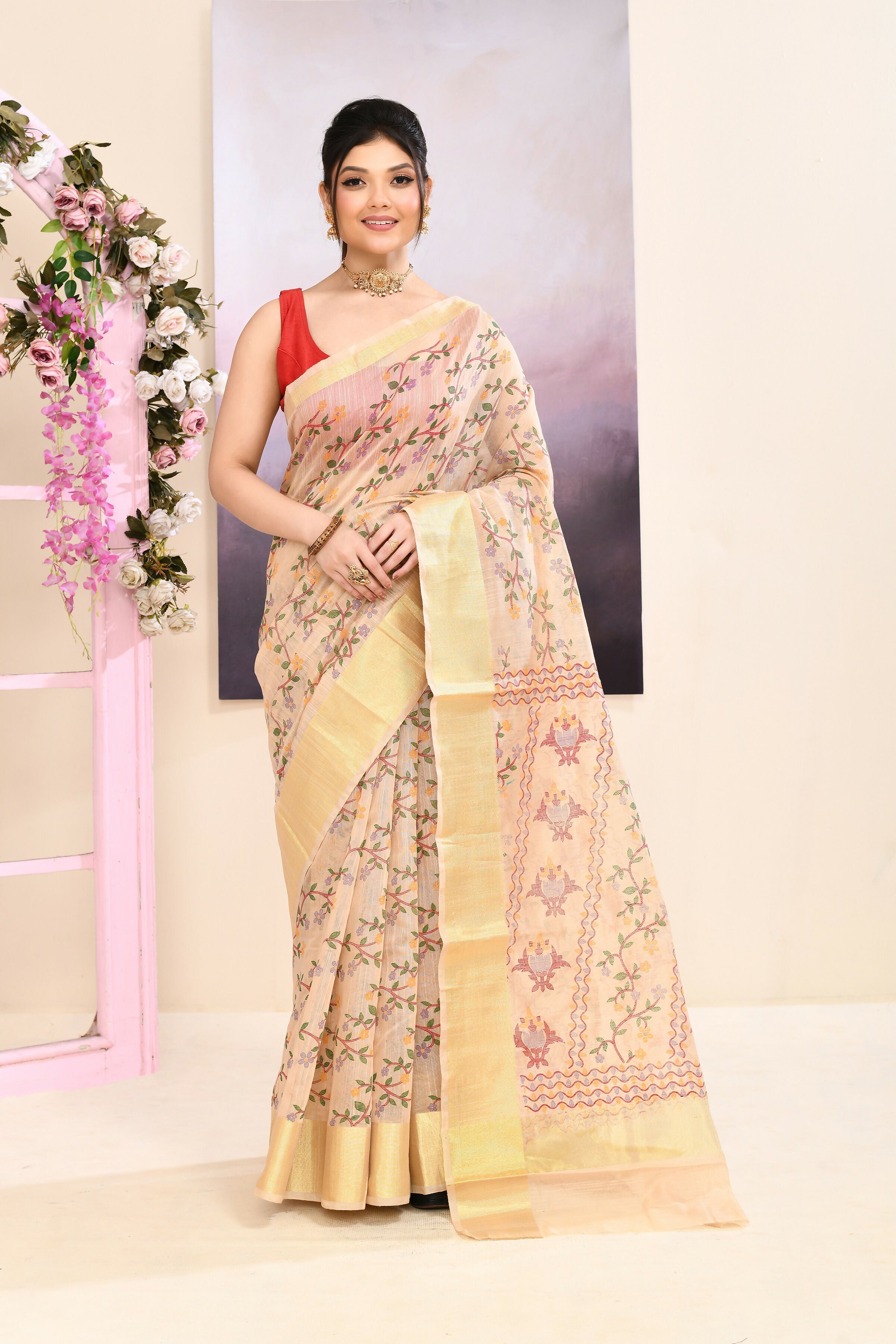 Beige cotton blend printed saree with subtle embellishments