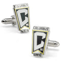 Columbus Crew logo cufflinks made of silver-plated metal and enamel, worn on a white dress shirt cuff.