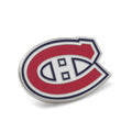Montreal Canadiens NHL team logo lapel pin in red, white, and blue enamel on silver-tone metal, shown on a grey suit lapel.