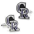 A pair of Colorado Rockies baseball team logo cufflinks in silver tone metal with purple and black enamel detail.