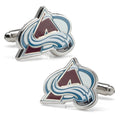 Close up of Colorado Avalanche NHL logo cufflinks in silver tone metal on a shirt cuff.