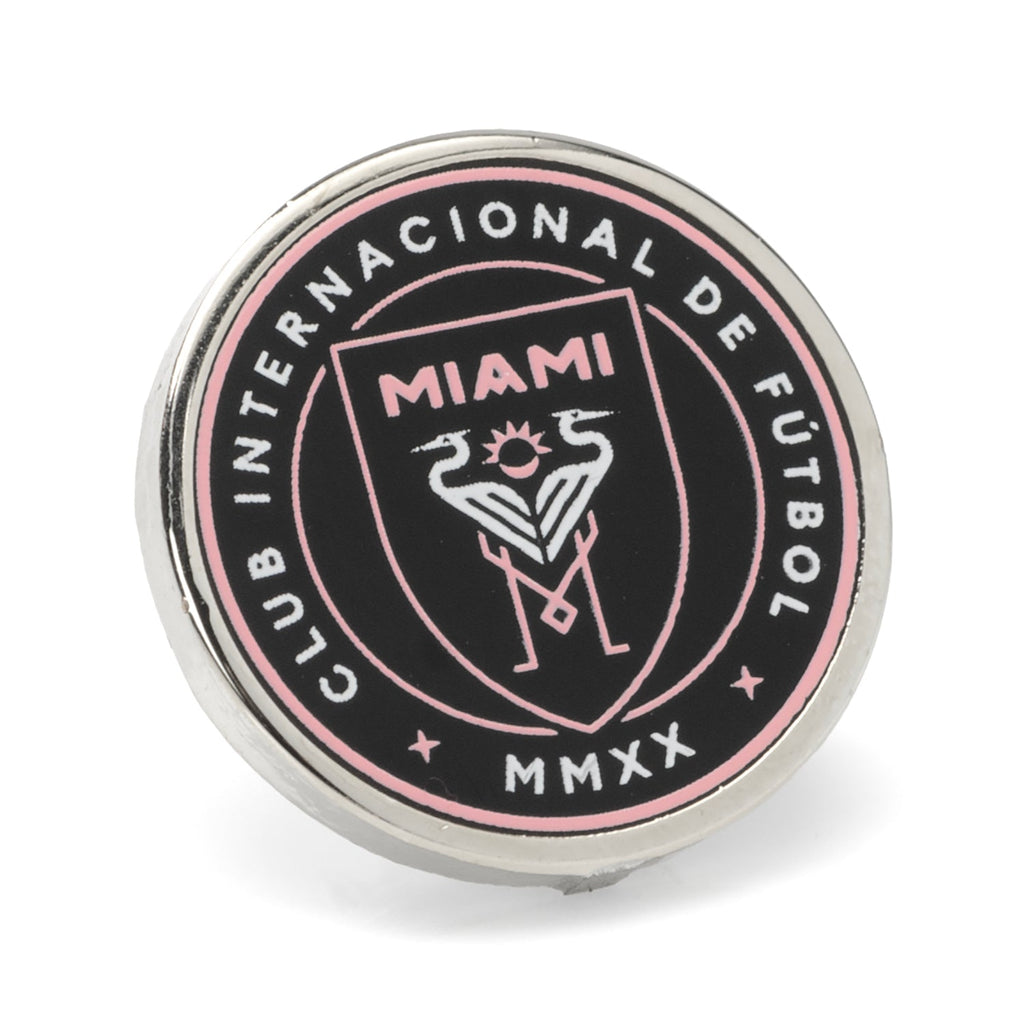 Close up of an official Inter Miami CF soccer team logo lapel pin in silver metal and black and pink enamel.