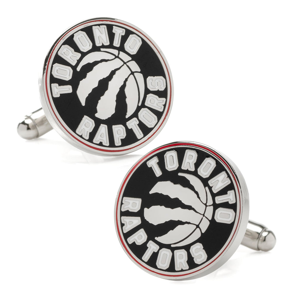 A pair of round Toronto Raptors basketball cufflinks with a silver tone finish and enamel team logo.