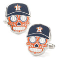 A pair of Houston Astros sugar skull cufflinks with baseball-themed eyes and the team logo on the cap.