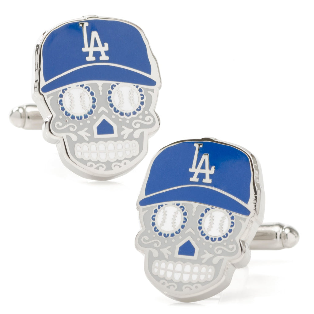 A pair of Los Angeles Dodgers themed sugar skull cufflinks with blue caps and baseball-style eyes.
