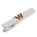 Silver tone Washington Commanders NFL logo tie clip against a dark blazer background