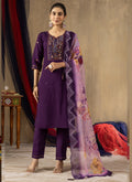 Close up of deep purple Roman silk fabric featuring elaborate multi-thread embroidery and handwork.