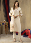 Close up of an Off White Shimmer Gold Silk kurta with detailed embroidery.