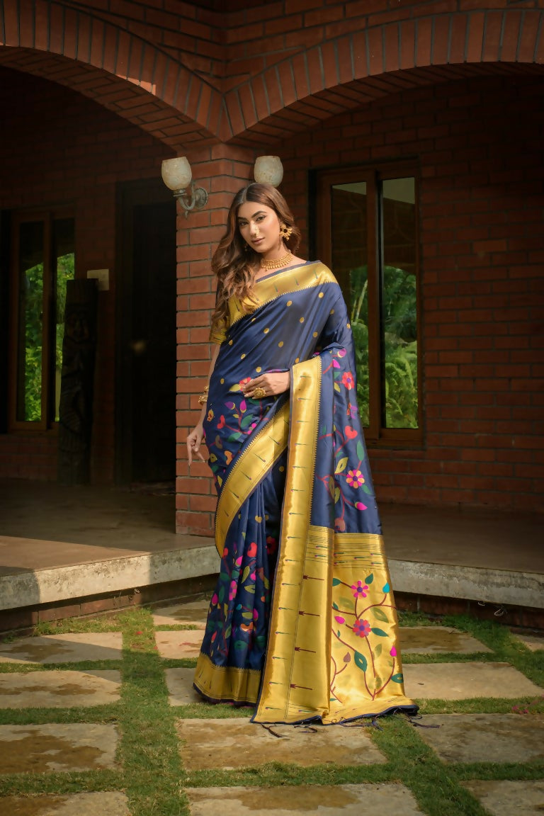 Sophisticated navy blue Paithani silk saree with intricate Zari woven detailing and matching blouse
