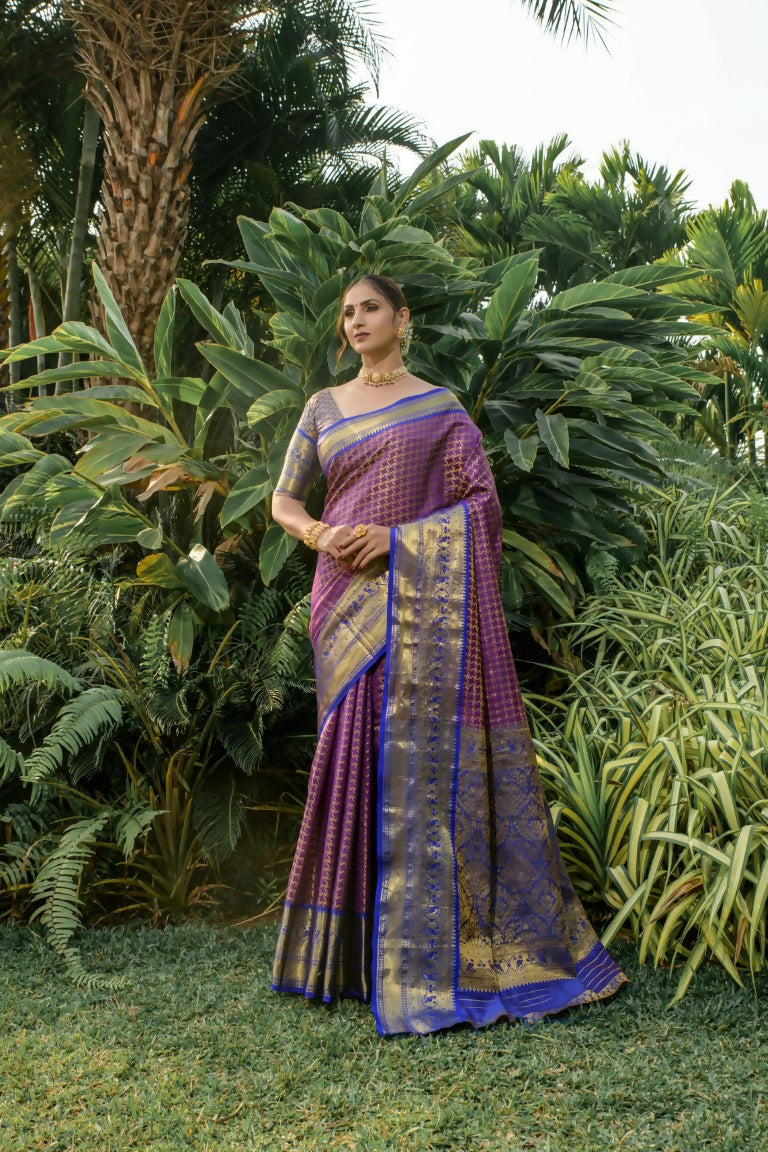 Purple Kanjivaram Silk Saree with Zari work and contrasting blue blouse