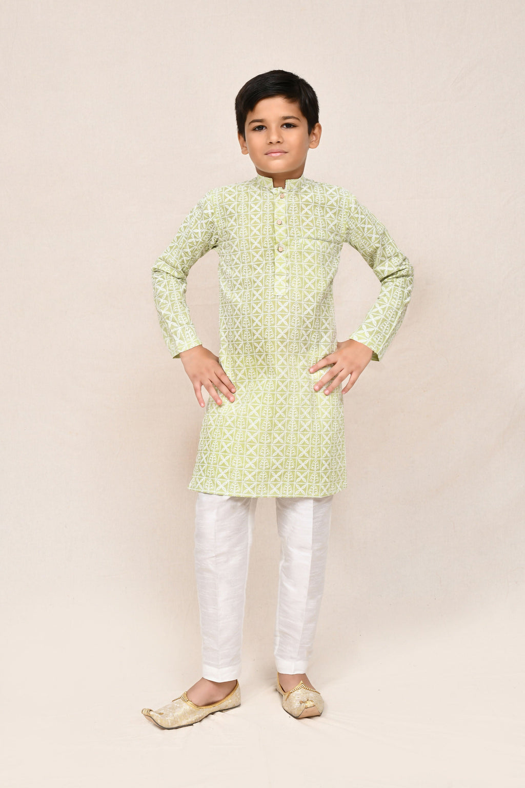 Pastel green cotton kurta paired with white art silk straight fit pants
