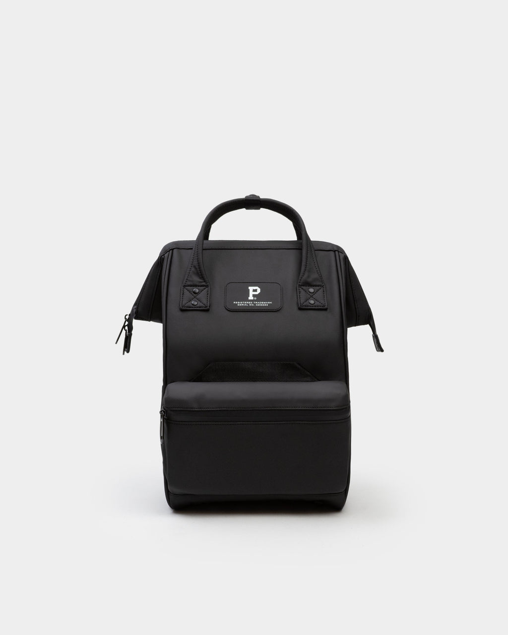 Minimalist Cascade Compact Backpack in solid color, showing weather-proof utility design