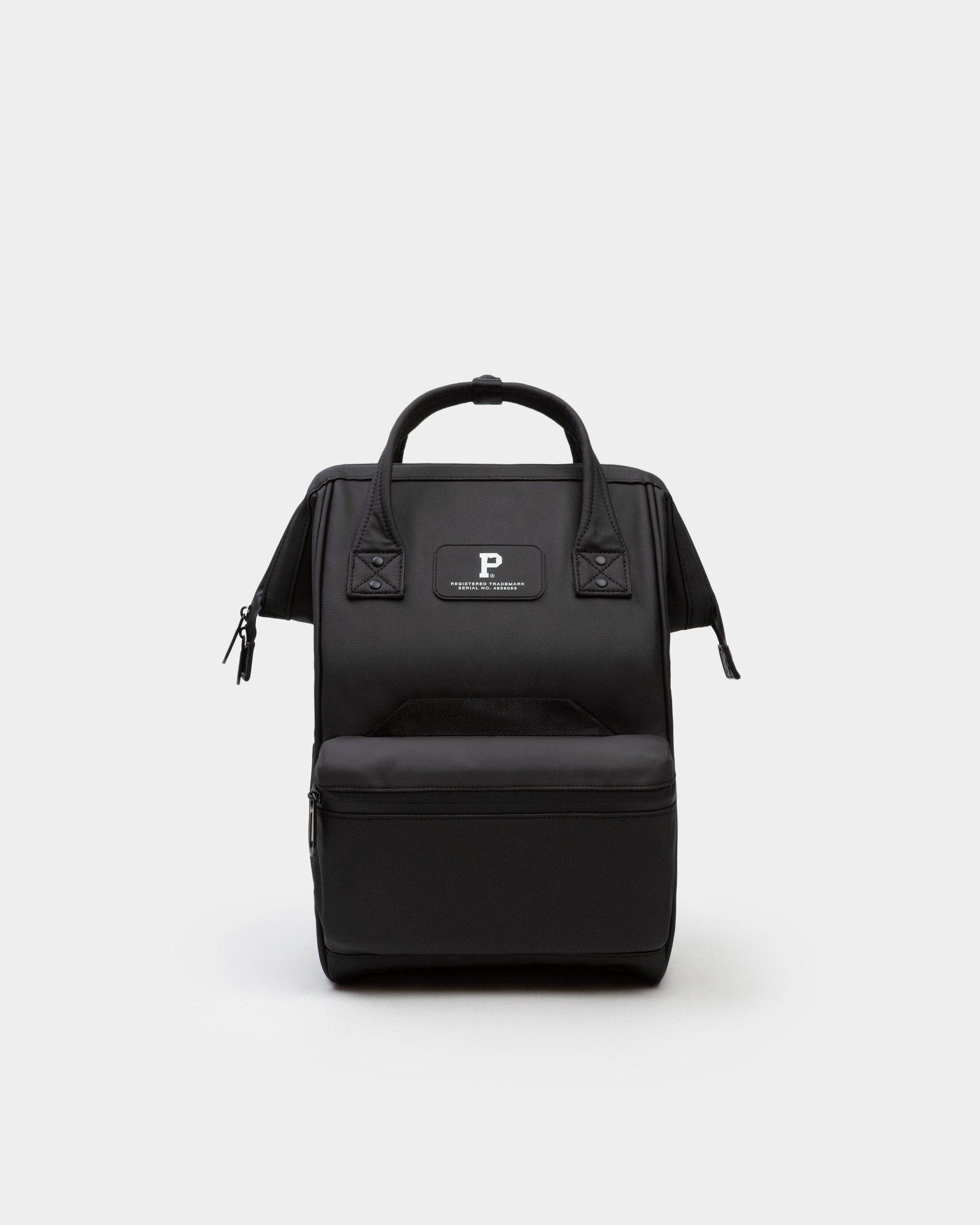 Minimalist Cascade Compact Backpack in solid color, showing weather-proof utility design