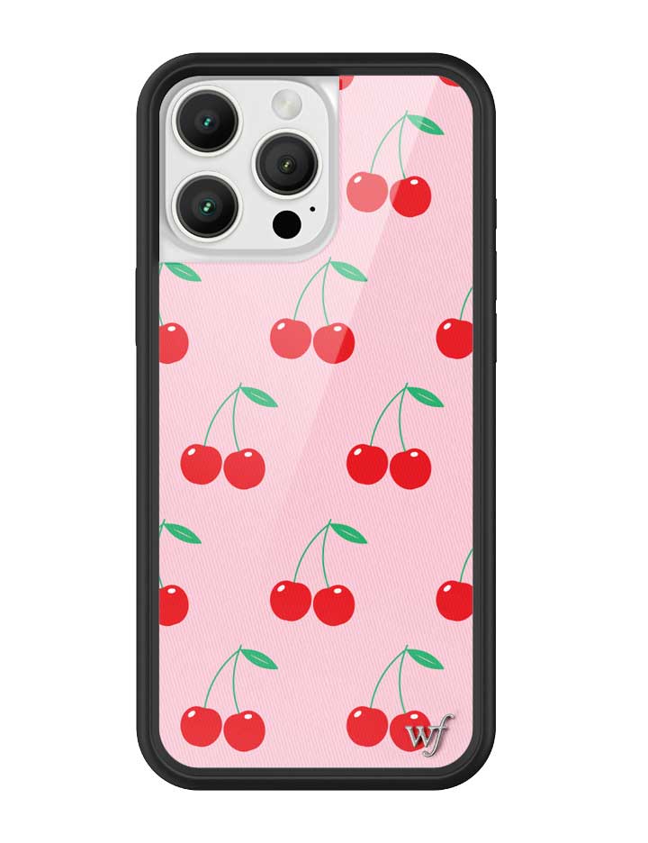Pink iPhone case with red cherry pattern and black protective rubber bumper