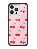 Pink iPhone case with red cherry pattern and black protective rubber bumper