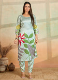 Light pista green printed cotton rayon kurta paired with matching printed pants.
