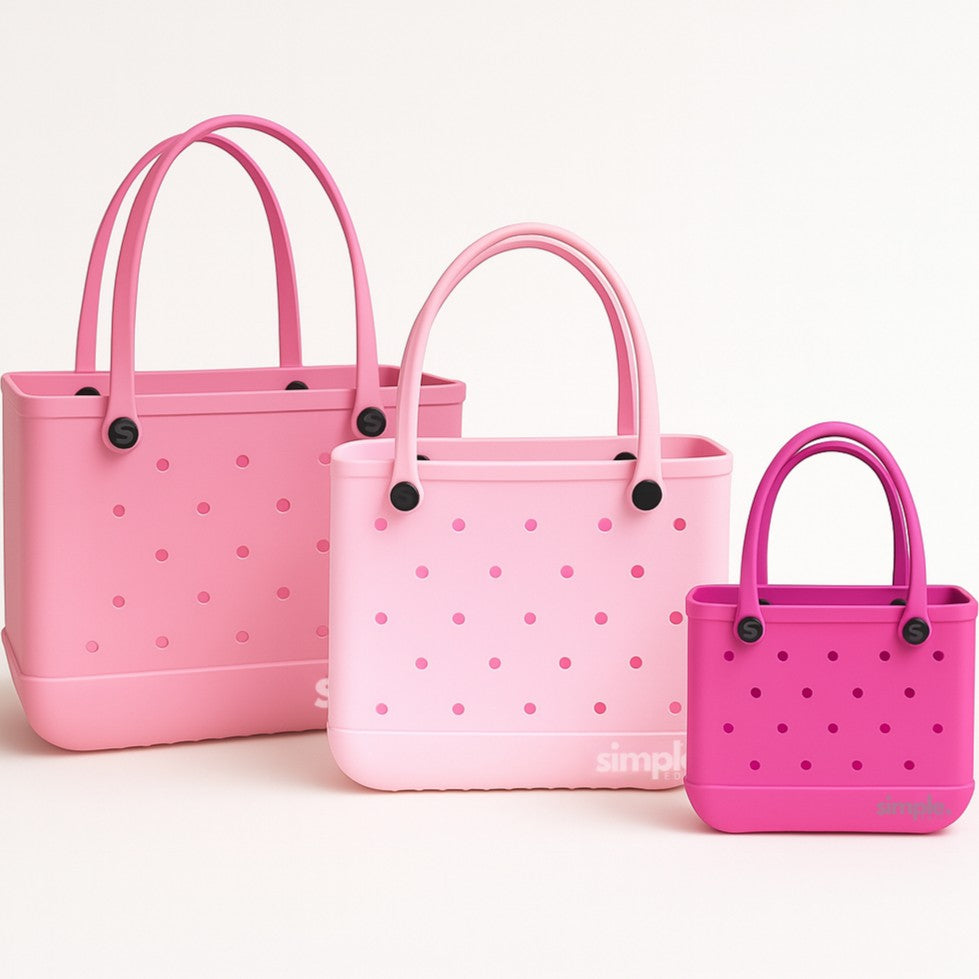 Set of three pink rubber EVA tote bags in XL, Medium, and Small sizes