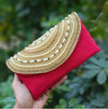 Red embellished potli clutch for women, festive style