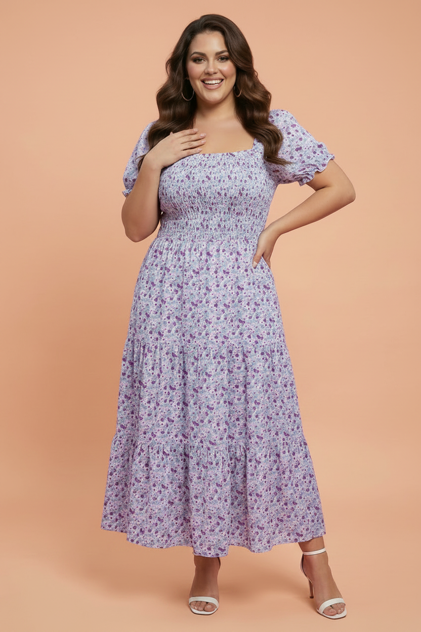 Plus size woman wearing a lavender floral print maxi dress with square neckline and puff sleeves