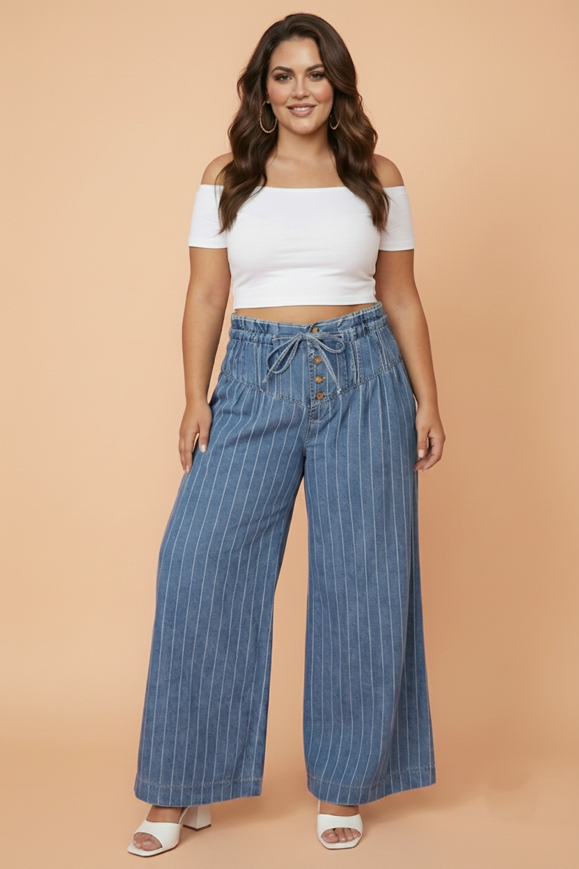 Woman wearing blue denim wide leg pants with vertical white pinstripes and button-front detail