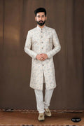 Off-White silk kurta for boys featuring detailed thread and sequence embroidery