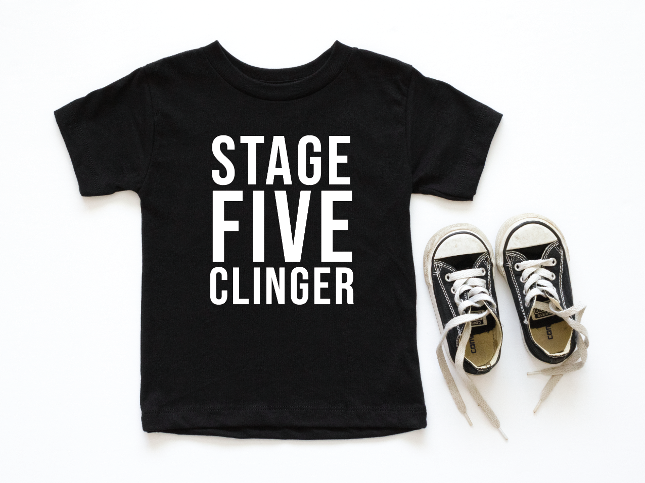 Child wearing a Stage FIVE Clinger graphic t-shirt available in black, white, or dusty-rose.