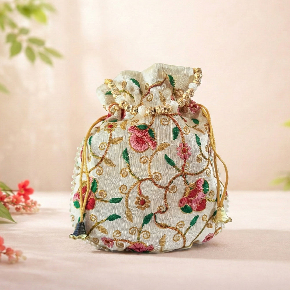Bridal silk brocade potli bag with pearl border and beaded handle for weddings and festive wear