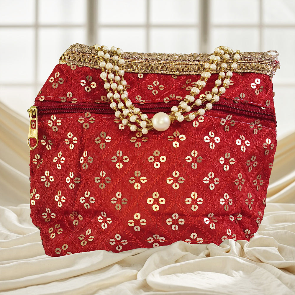 Luxurious silk brocade potli bag with pearl borders and beaded handle for weddings