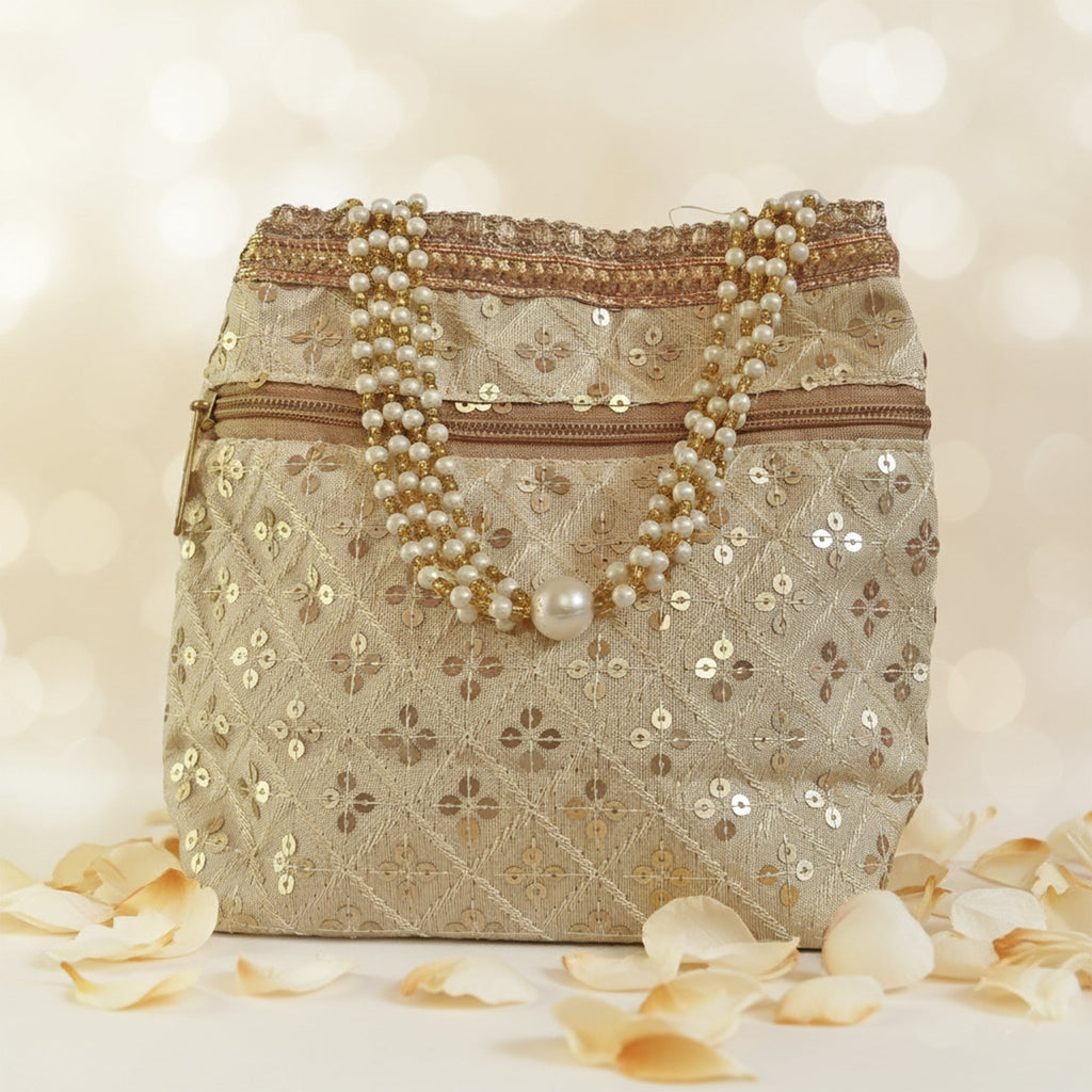 Luxurious silk brocade wedding potli bag with pearl borders and beaded handles