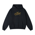 Black and gold festive Christmas hoodie with Tidings of Comfort and Joy print