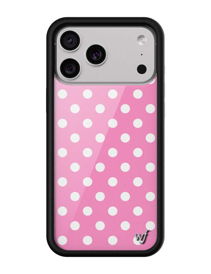 A pink iPhone case with white polka dots, black rubber bumper, and a silver WF logo.