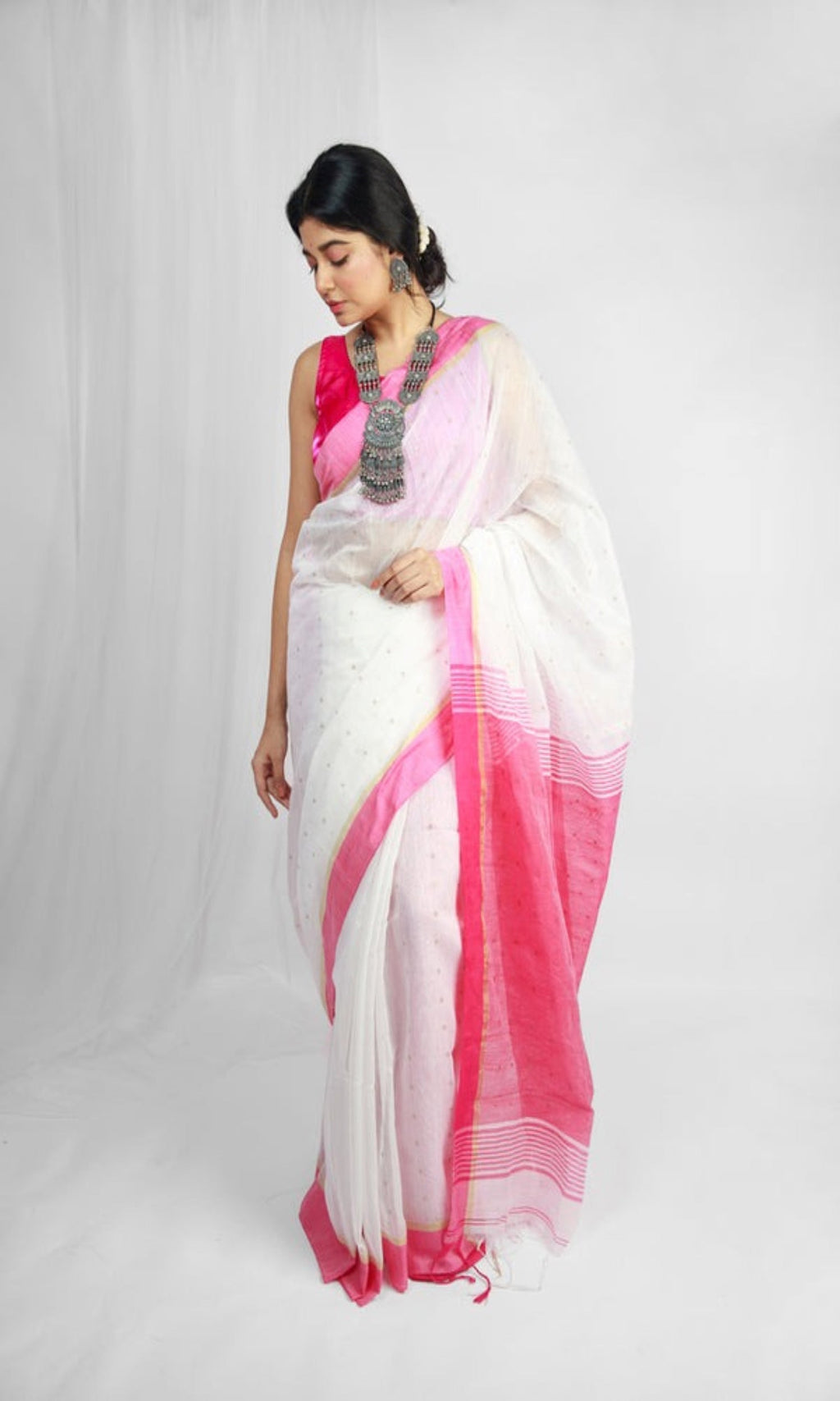 White handloom cotton blend saree with delicate sequin embellishments