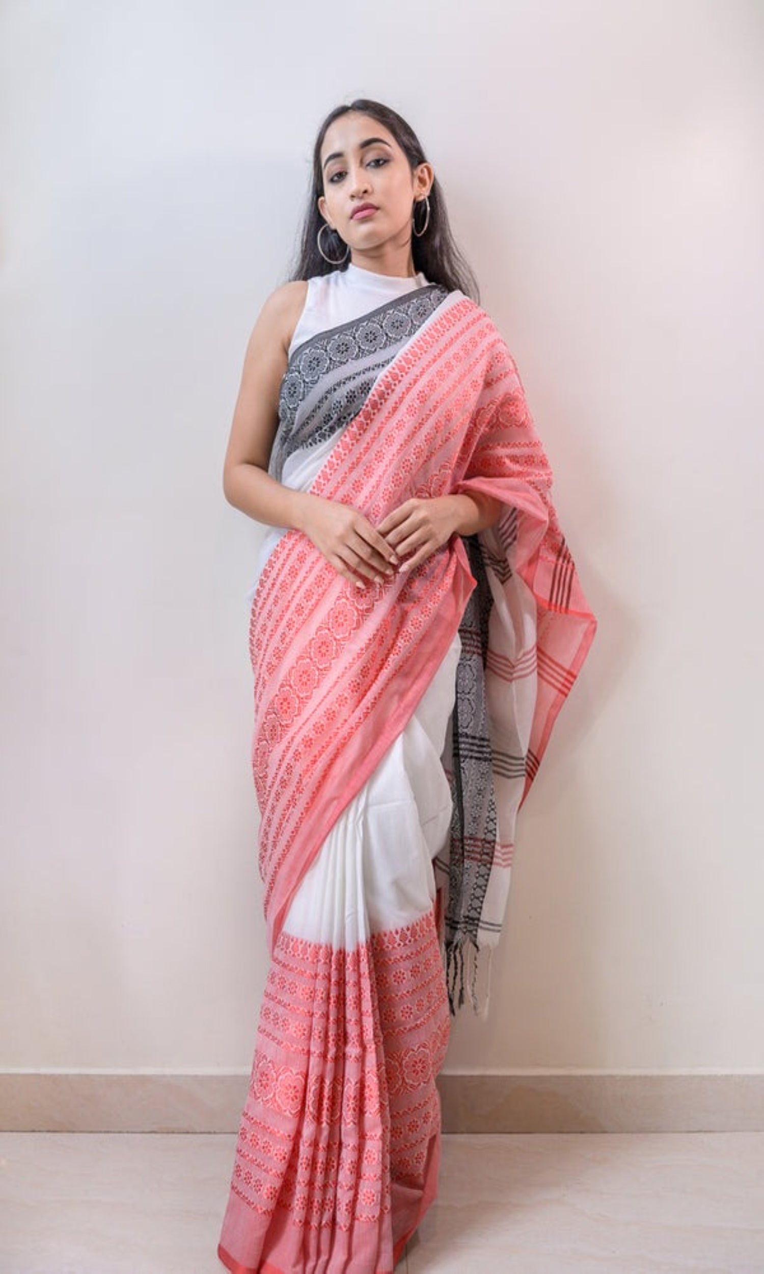 Classic white handloom Begampuri cotton saree with traditional weave texture