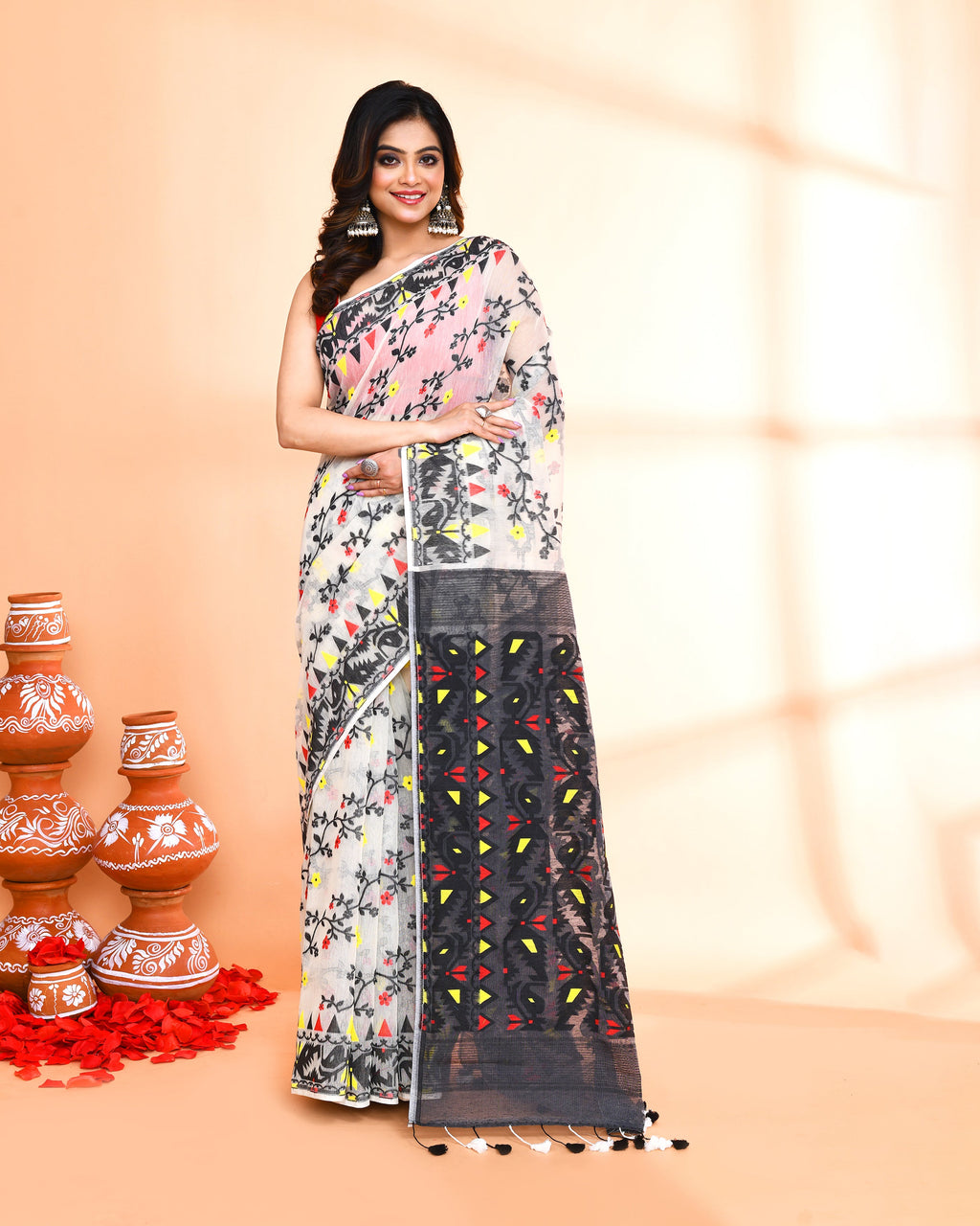 Off-white and black Jamdani saree featuring intricate handspun cotton-silk weaving