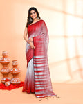 Silver handloom cotton silk saree with matching blouse piece draped elegantly