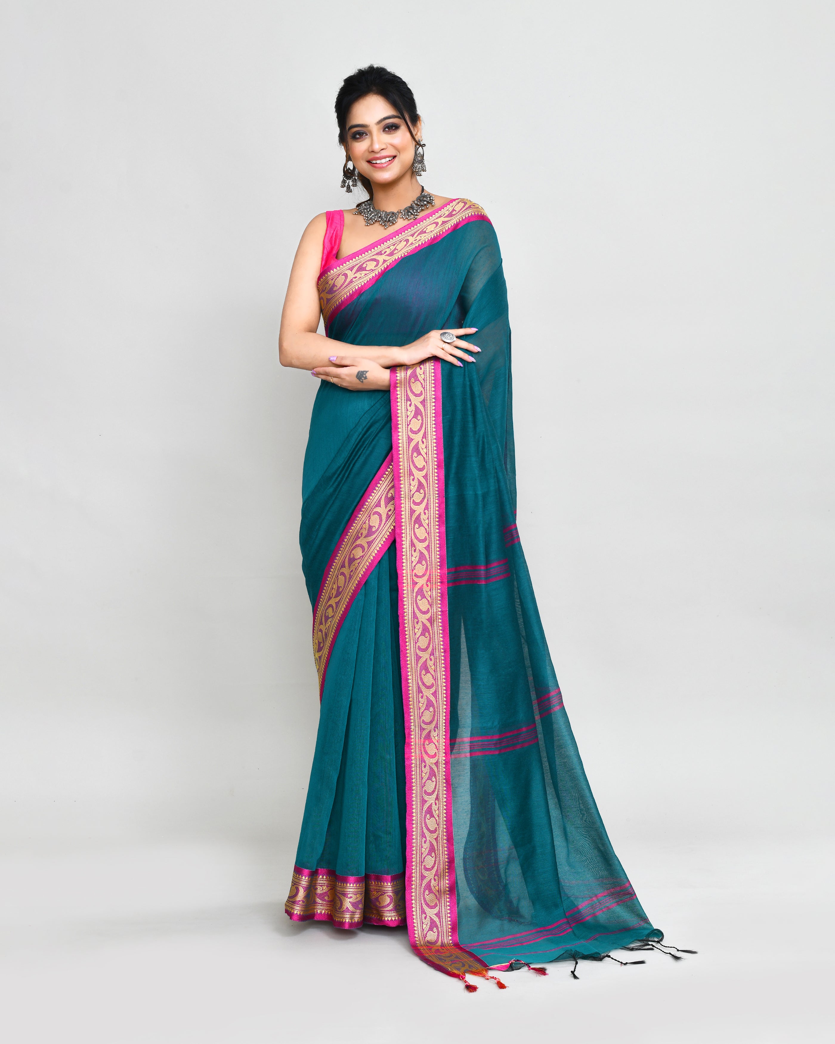 Vibrant teal cotton silk handloom saree with matching blouse piece