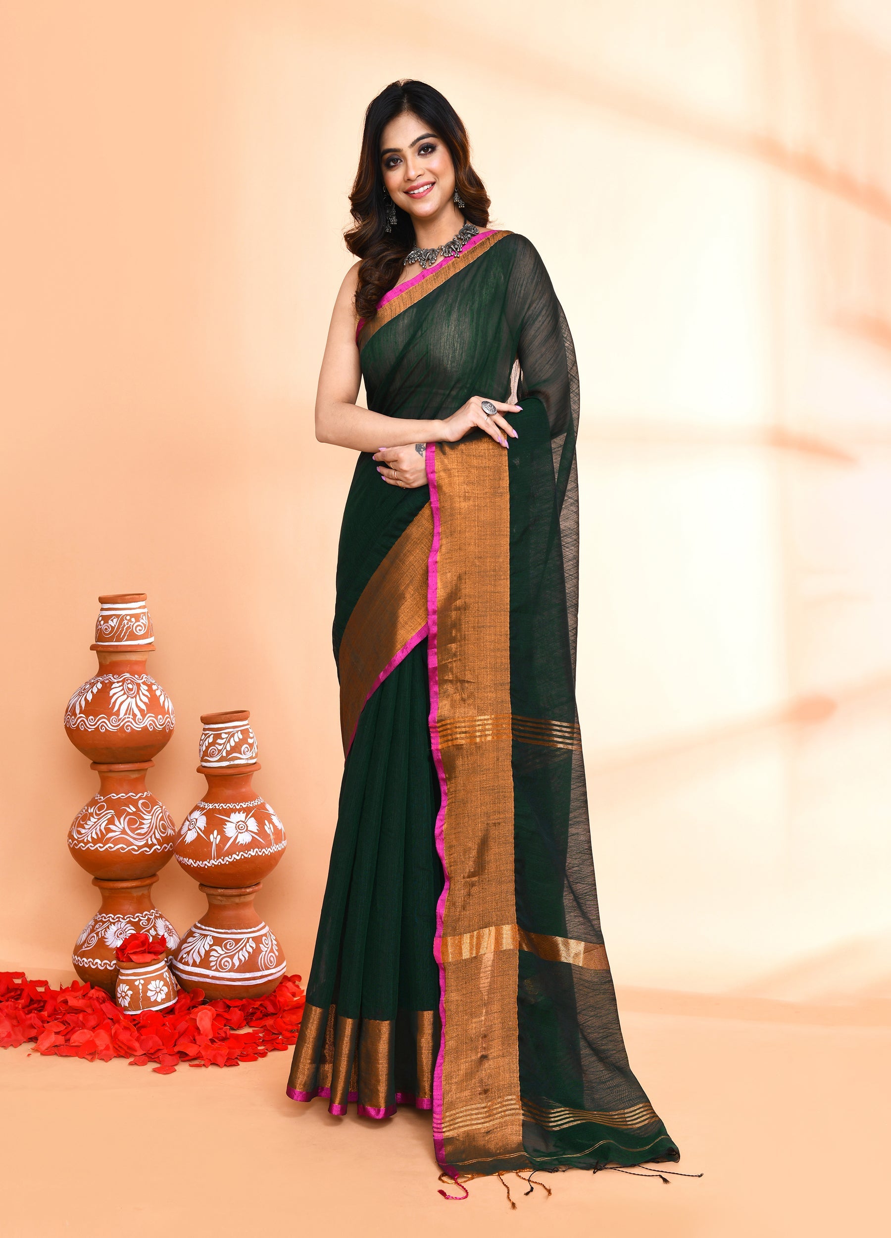 Dark green handloom cotton blend saree with matching blouse piece
