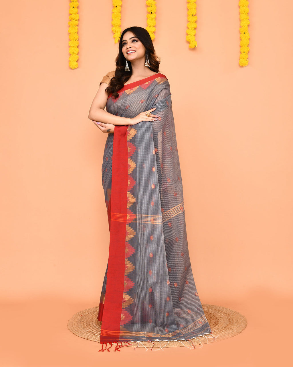 Grey Handloom Cotton Blend Saree with a traditional red temple border